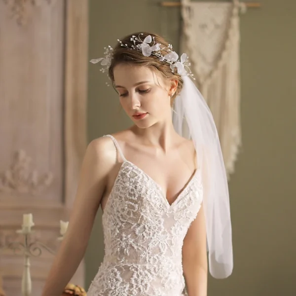 voile bohème avec couronne fleurie et perles